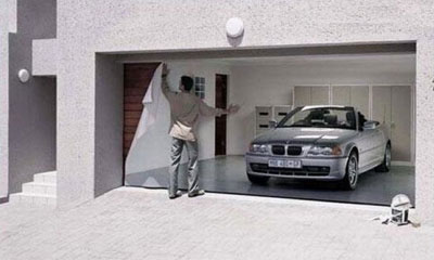 poster of a car on the garage door
